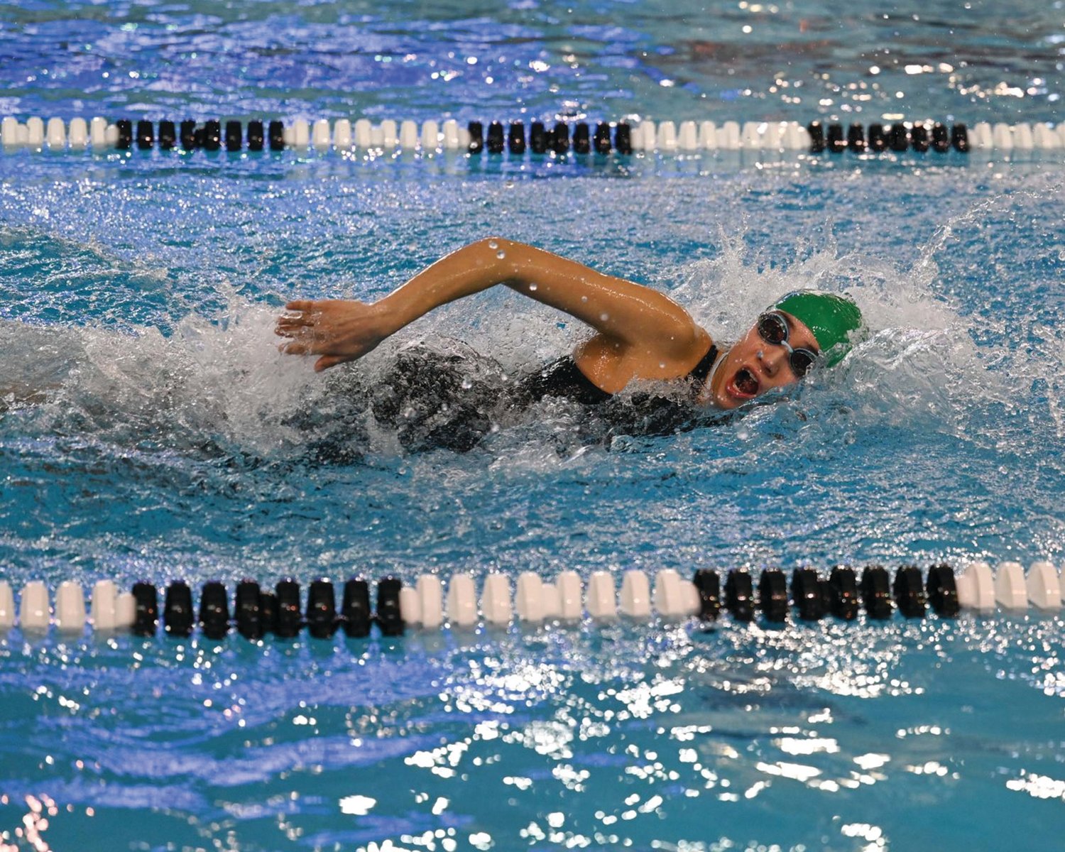 RELAY: East’s Samaira Sierra competes in a relay.